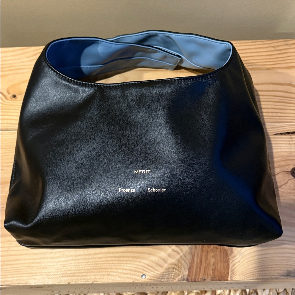 Merit x Proenza Schouler Reversible Vegan Knot Tie Clutch Black Light Blue - Picture 5 of 10